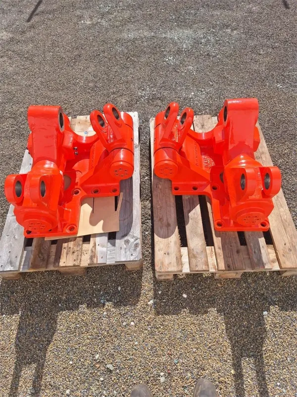 Two new orange Sandvik drill parts